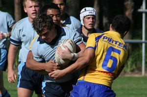Reece Regan gets wrapped up by the Eelds defence - Parramatta Eels Harold Matthews Cup Vs NSW CCC U 15's (Photo : ourfooty media)