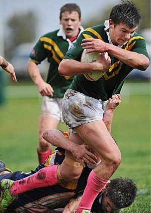 Farrer centre Joh Mathers almost breaks through the Bathurst defence in the Uni Shield semi-final.