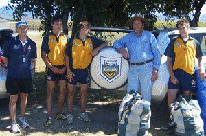 Ross Padget, Jordan Grayston and George Griffin with the kids from Calen Primary School