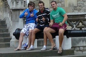 Clinton, Taylor & Matt sit on an old cannon 