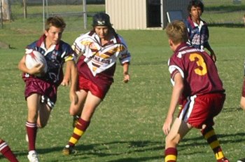 MSHS fulback Jessie Walker about to put a move on Sarina's Eddie Hounslow