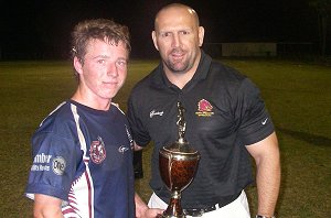 Michael Hancock presents Matt Gilliman with his trophy